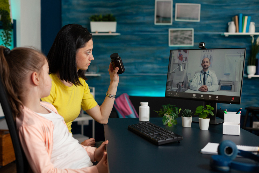 mom and girl having tele-health primary care online consultation