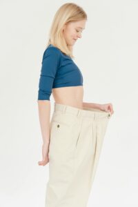 woman in wide pants weight loss