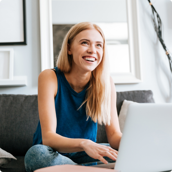 Happy Woman Smiling durng Online Primary Care Consultation